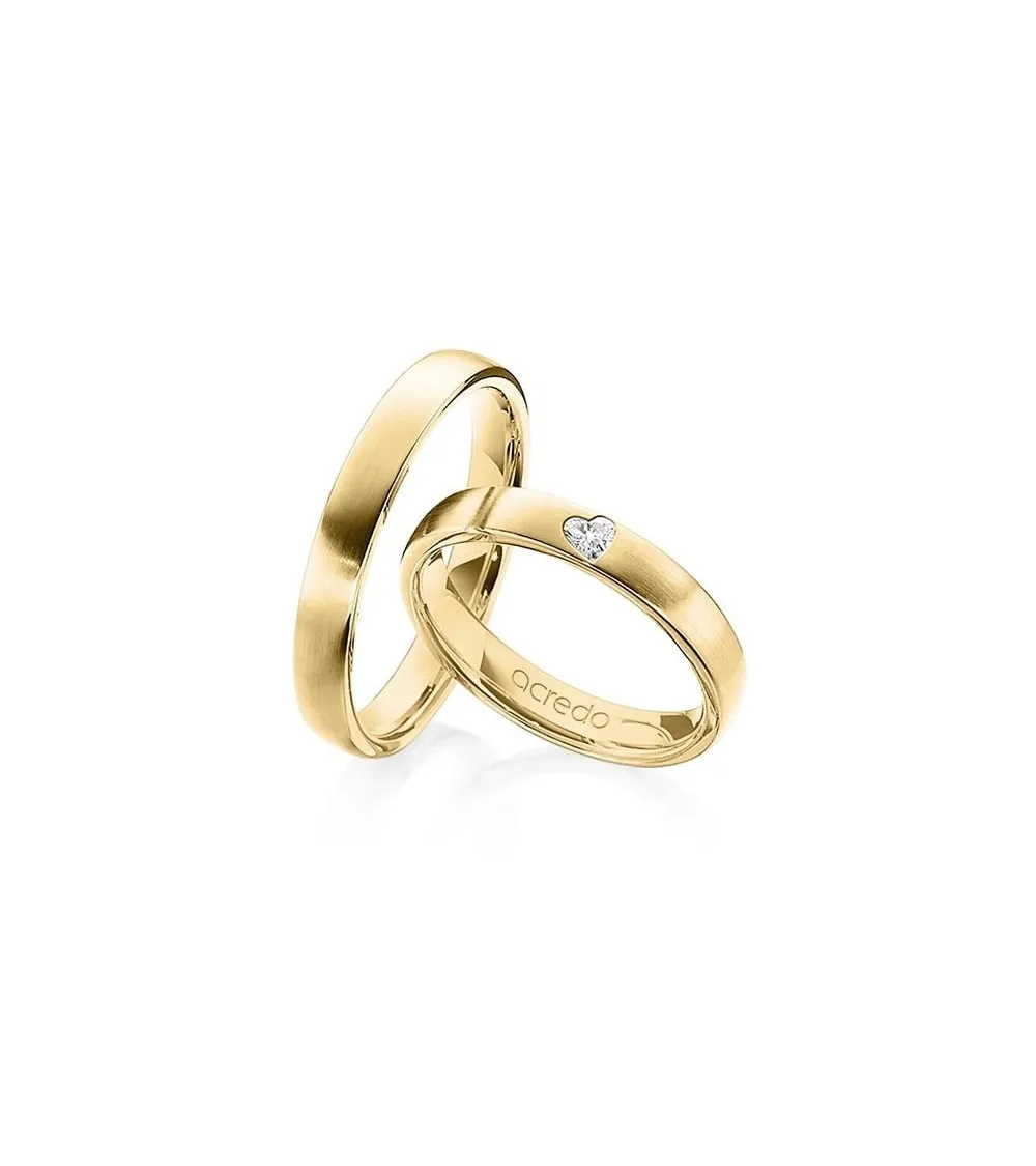 Anillos de boda en oro de 14 o 18K con un diamante corazón en mate